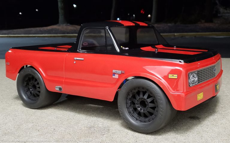 URCG Edition - Traxxas Slash 4x4, JConcepts body - Red Chevy 72 C-10, ProLine Prime Tires - named Big Red (side view)