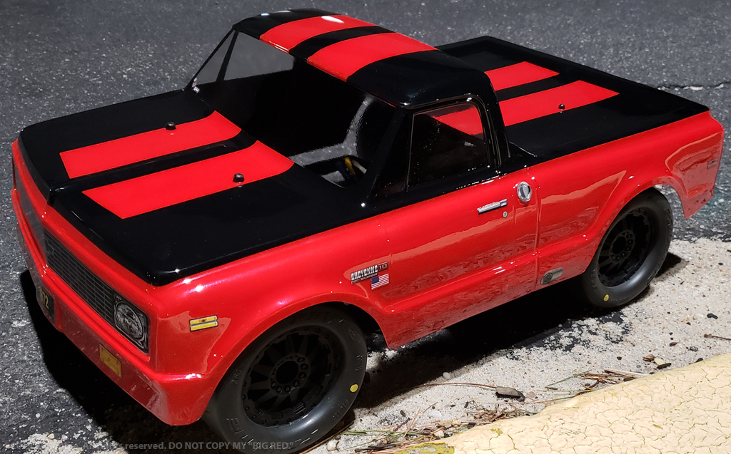 URCG Edition - Traxxas Slash 4x4, JConcepts body - Red Chevy 72 C-10, ProLine Prime Tires - named Big Red (side view)
