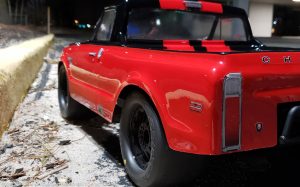 URCG Edition - Traxxas Slash 4x4, JConcepts body - Red Chevy 72 C-10, ProLine Prime Tires - named Big Red (side view)