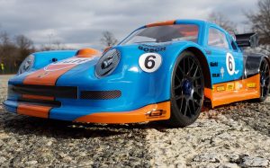 URCG Edition - Traxxas Slash 4x4, Delta Plastik USA body - Blue Porsche 911 GT3, Sweep Racing Tires - named Gulfie (front view)