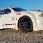 URCG Edition - Traxxas Slash 4x4, Delta Plastik USA body - White BMW M3, Sweep Racing Tires - named Big Pearls (side view)