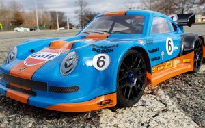URCG Edition - Traxxas Slash 4x4, Delta Plastik USA body - Blue Porsche 911 GT3, Sweep Racing Tires - named Gulfie (front view)