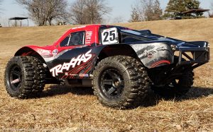 URCG Edition - Traxxas Slash 4x4 TSM OBA - Mark Jenkins, ProLine Trencher Tires - named Larry The Lawnmower (rear view)