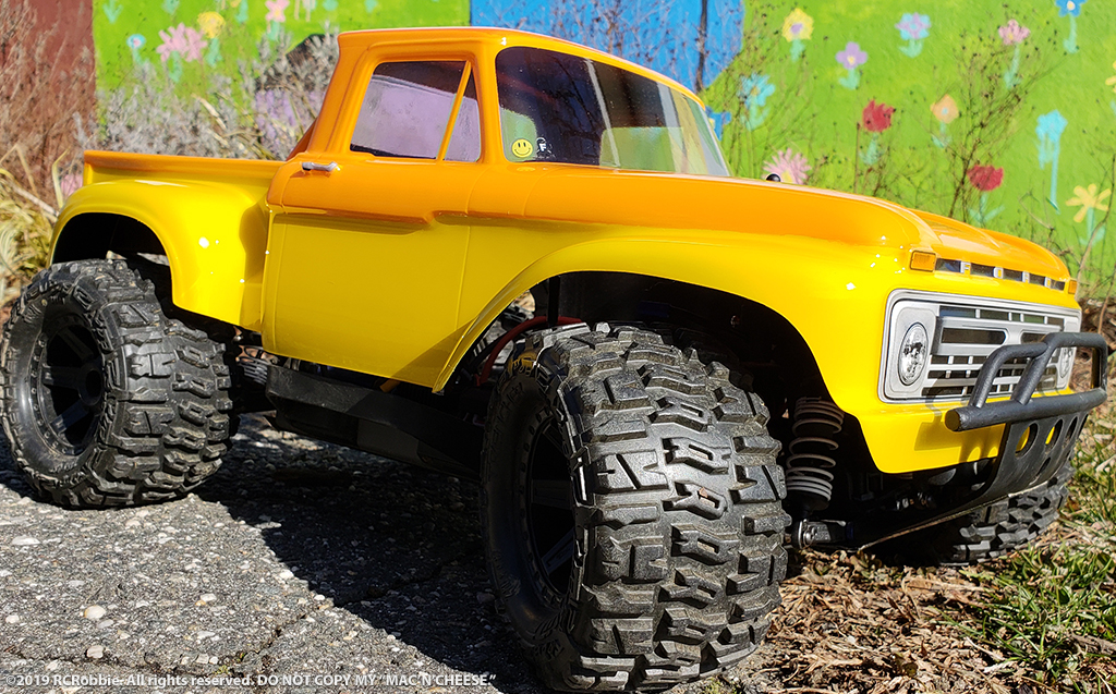 URCG Edition - Traxxas Slash 4x4, ProLine body - Yellow Ford 66 F-100, ProLine Trencher Tires - named Mac 'n' Cheese (side view)