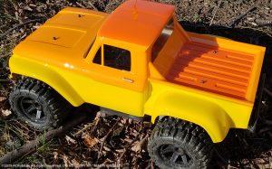 URCG Edition - Traxxas Slash 4x4, ProLine body - Yellow Ford 66 F-100, ProLine Trencher Tires - named Mac 'n' Cheese (top view)
