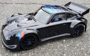 URCG Edition - Traxxas Slash 4x4, Delta Plastik USA body - Black Porsche 911 GT3, Sweep Racing Tires - named Midnight Madness (side view)