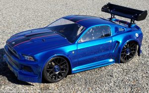 URCG Edition - Traxxas Slash 4x4, Delta Plastik USA body - Royal Blue Ford Mustang, Sweep Racing Tires - named Mustang Sally (side view)