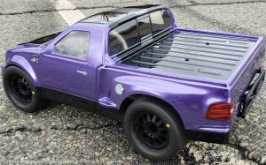 URCG Edition - Traxxas Slash 4x4, JConcepts body - Purple Ford 99 Lightning, ProLine Prime Tires - named Purple Lightning (top view)