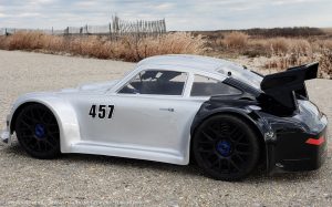 URCG Edition - Traxxas Slash 4x4, Delta Plastik USA body - Silver Porsche 911 GT3, Sweep Racing Tires - named Tuxedo Rob (side view)