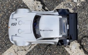 URCG Edition - Traxxas Slash 4x4, Delta Plastik USA body - Silver Porsche 911 GT3, Sweep Racing Tires - named Tuxedo Rob (top view)