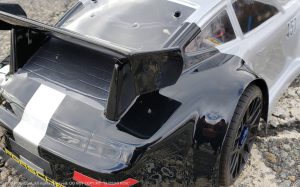 URCG Edition - Traxxas Slash 4x4, Delta Plastik USA body - Silver Porsche 911 GT3, Sweep Racing Tires - named Tuxedo Rob (rear view)