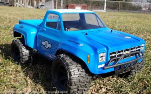 URCG Edition - Traxxas Slash 4x4, JConcepts body - Blue Chevy 78 C-10, ProLine Trencher Tires - named Winter Beater (side view)