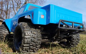 URCG Edition - Traxxas Slash 4x4, JConcepts body - Blue Chevy 78 C-10, ProLine Trencher Tires - named Winter Beater (rear view)
