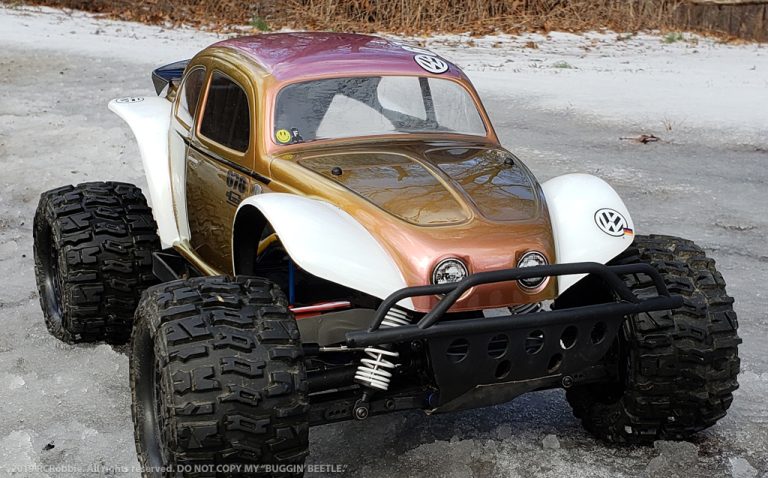 URCG Edition - Traxxas Slash 4x4, Pro-Line body - Iridescent Pink/Gold, Anodized Pink Aluminum Roof, and white fendered Volkswagen Beetle, Proline Trencher Tires - named Buggin' Beetle