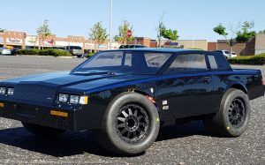 URCG Edition - Traxxas Slash 4x4, JConcepts body - Black with Metallic Blue Pinstriped 1982 Buick Grand National, 2-Door, ProLine Prime Tires - named GRAND NATS