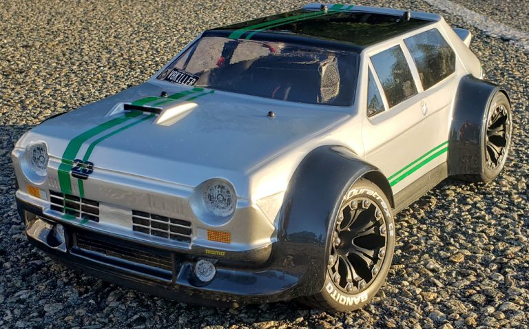 URCG Edition - Traxxas Slash 4x4, Delta Plastik USA body - Silver FR TC 105 Rally GT, Duratrax Bandito Tires - named Fender Juice
