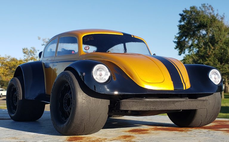 URCG Edition - Traxxas Slash 4x4, Pro-Line body - Gold and black fendered Volkswagen Beetle with racing stripe, Proline Prime Tires - named Gold Buggin'