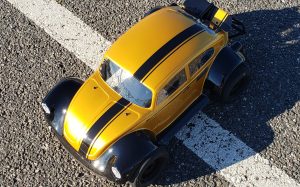 URCG Edition - Traxxas Slash 4x4, Pro-Line body - Gold and black fendered Volkswagen Beetle with racing stripe, Proline Prime Tires - named Gold Buggin'