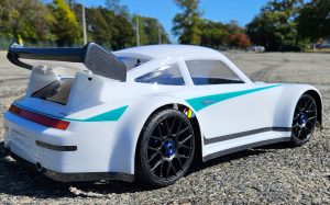 URCG Edition - Traxxas Slash 4x4, Delta Plastik USA body - White Porsche 911 GT3, Sweep Racing Tires - named 911Alex