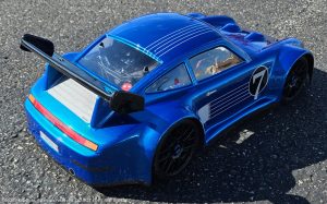 URCG Edition - Traxxas Slash 4x4, Delta Plastik USA body - Metallic Blue Porsche 911 GT3, Sweep Racing Tires - named Breccs