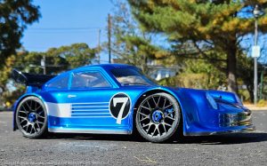 URCG Edition - Traxxas Slash 4x4, Delta Plastik USA body - Metallic Blue Porsche 911 GT3, Sweep Racing Tires - named Breccs