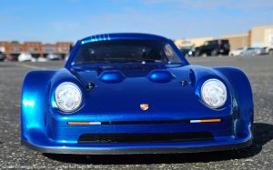 URCG Edition - Traxxas Slash 4x4, Delta Plastik USA body - Metallic Blue Porsche 911 GT3, Sweep Racing Tires - named Breccs