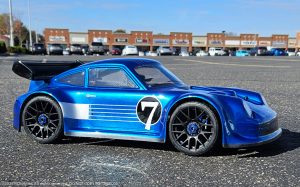 URCG Edition - Traxxas Slash 4x4, Delta Plastik USA body - Metallic Blue Porsche 911 GT3, Sweep Racing Tires - named Breccs