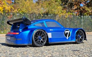 URCG Edition - Traxxas Slash 4x4, Delta Plastik USA body - Metallic Blue Porsche 911 GT3, Sweep Racing Tires - named Breccs