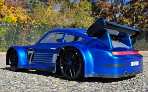 URCG Edition - Traxxas Slash 4x4, Delta Plastik USA body - Metallic Blue Porsche 911 GT3, Sweep Racing Tires - named Breccs