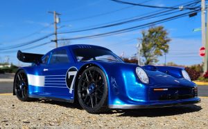 URCG Edition - Traxxas Slash 4x4, Delta Plastik USA body - Metallic Blue Porsche 911 GT3, Sweep Racing Tires - named Breccs