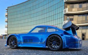 URCG Edition - Traxxas Slash 4x4, Delta Plastik USA body - Metallic Blue Porsche 911 GT3, Sweep Racing Tires - named SixThree