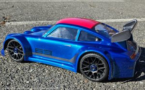 URCG Edition - Traxxas Slash 4x4, Delta Plastik USA body - Metallic Blue Porsche 911 GT3, Sweep Racing Tires - named SixThree