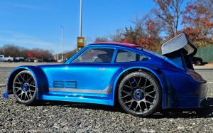 URCG Edition - Traxxas Slash 4x4, Delta Plastik USA body - Metallic Blue Porsche 911 GT3, Sweep Racing Tires - named SixThree