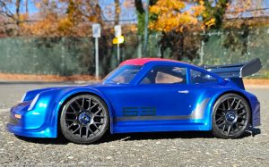 URCG Edition - Traxxas Slash 4x4, Delta Plastik USA body - Metallic Blue Porsche 911 GT3, Sweep Racing Tires - named SixThree