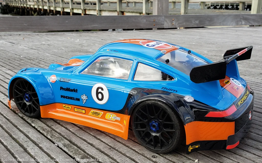 URCG Edition - Traxxas Slash 4x4, Delta Plastik USA body - Blue Porsche 911 GT3, Sweep Racing Tires - named Gulfie (side view)