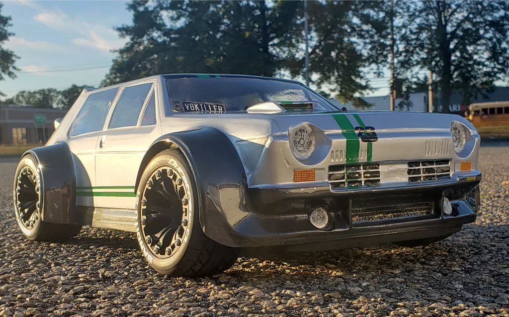 URCG Edition - Traxxas Slash 4x4, Delta Plastik USA body - Silver FR TC 105 Rally GT, Duratrax Bandito Tires - named Fender Juice