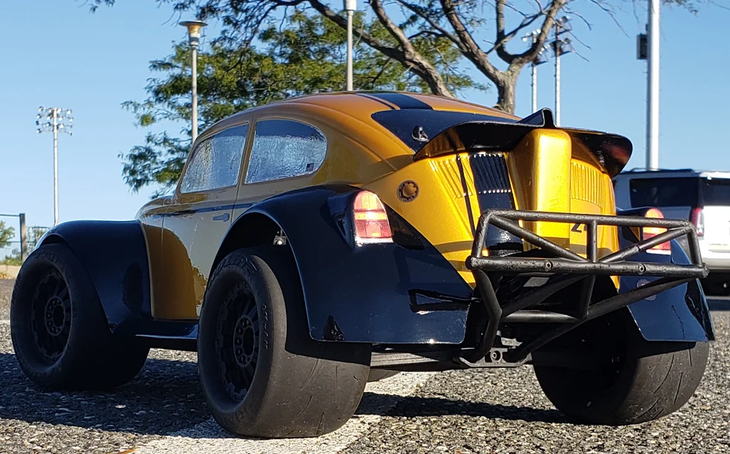 URCG Edition - Traxxas Slash 4x4, Pro-Line body - Gold and black fendered Volkswagen Beetle with racing stripe, Proline Prime Tires - named Gold Buggin'