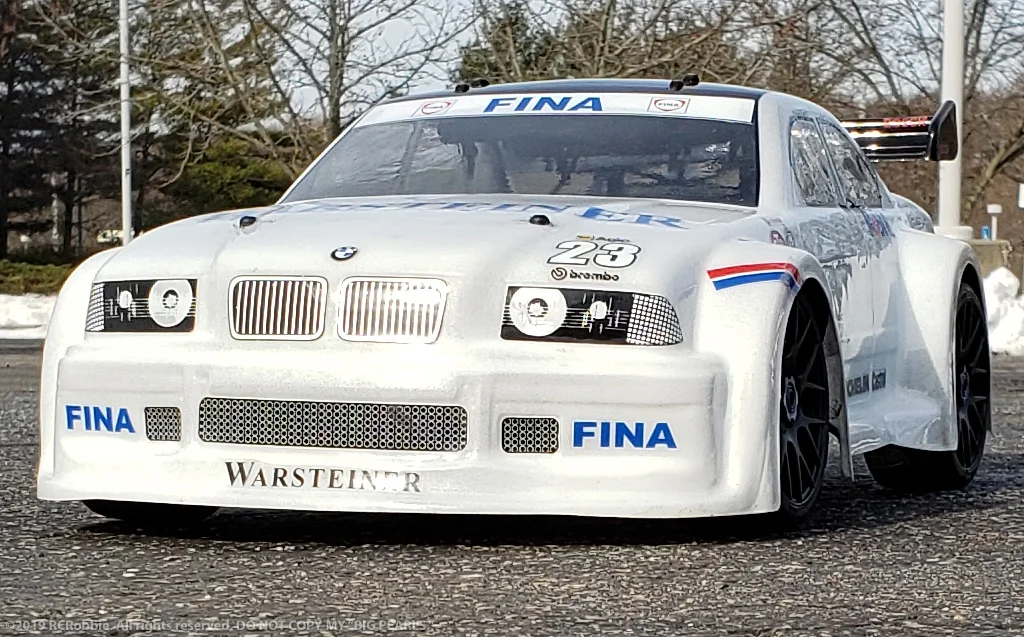 URCG Edition - Traxxas Slash 4x4, Delta Plastik USA body - White BMW M3, Sweep Racing Tires - named Big Pearls (side view)