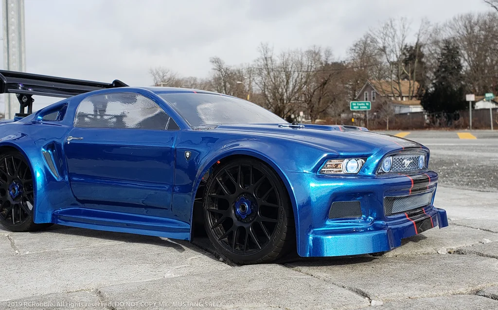 URCG Edition - Traxxas Slash 4x4, Delta Plastik USA body - Royal Blue Ford Mustang, Sweep Racing Tires - named Mustang Sally (side view)