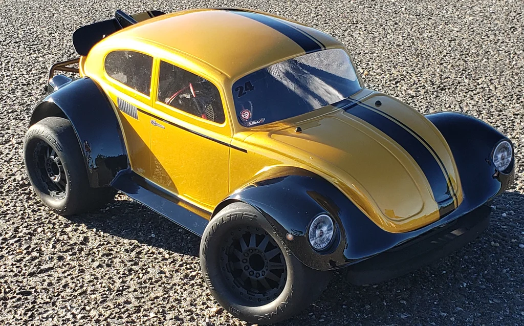 URCG Edition - Traxxas Slash 4x4, Pro-Line body - Gold and black fendered Volkswagen Beetle with racing stripe, Proline Prime Tires - named Gold Buggin'