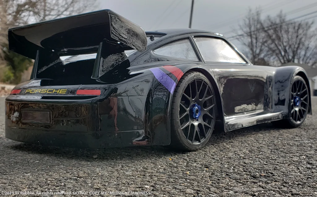 URCG Edition - Traxxas Slash 4x4, Delta Plastik USA body - Black Porsche 911 GT3, Sweep Racing Tires - named Midnight Madness (side view)