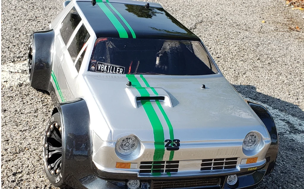 URCG Edition - Traxxas Slash 4x4, Delta Plastik USA body - Silver FR TC 105 Rally GT, Duratrax Bandito Tires - named Fender Juice