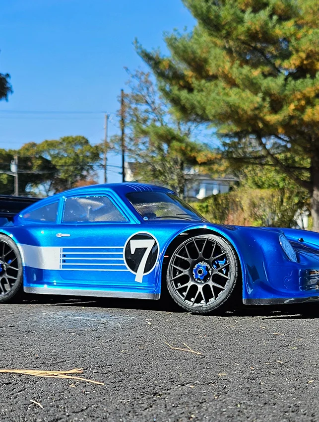 URCG Edition - Traxxas Slash 4x4, Delta Plastik USA body - Metallic Blue Porsche 911 GT3, Sweep Racing Tires - named Breccs