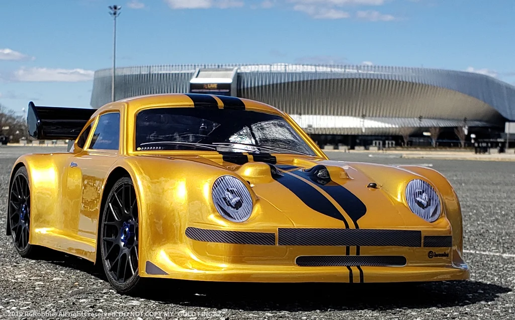 URCG Edition - Traxxas Slash 4x4, Delta Plastik USA body - Gold Porsche 911 GT3, Sweep Racing Tires - named Gold Fingaz