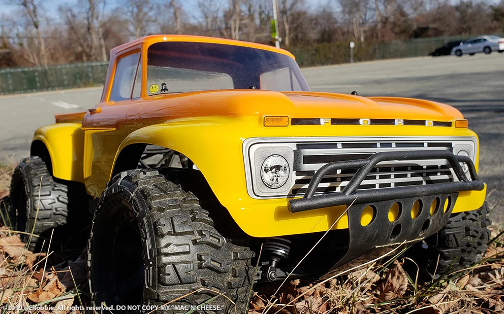 URCG Edition - Traxxas Slash 4x4, ProLine body - Yellow Ford 66 F-100, ProLine Trencher Tires - named Mac 'n' Cheese (front view)